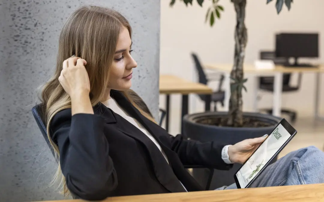 medium shot woman reading digital magazine